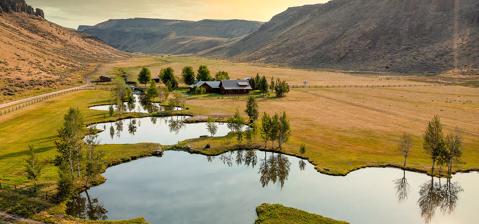 A lake and a house in Sun Valley Real Estate